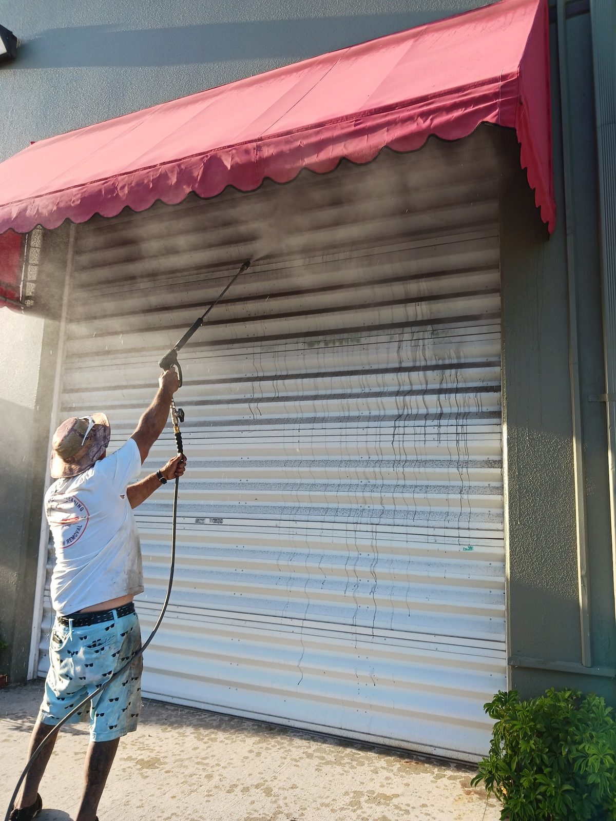 Storefront roll-up shutter washdown